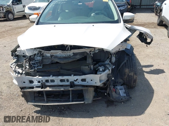 2016 Ford Focus Titanium with VIN 1FADP3N28GL222941, listed as a IAAI auction lot 42050881 with 97,001 mi miles and . Bid and sale history available at DreamBid. Image 6.