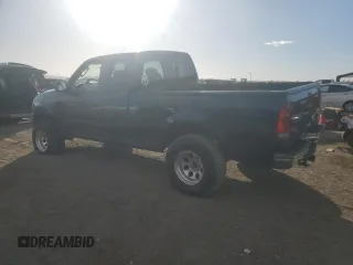 2003 Ford F-150 XL with VIN 1FTRX17L13NA95202, listed as a Copart auction lot 87766385 with 124,961 mi miles and Salvage Title. Bid and sale history available at carsss.com. Image 2.
