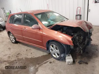 2007 Kia Spectra with VIN KNAFE162575000628, listed as a IAAI auction lot 41353741 with 152,693 mi miles. Bid and sale history available at carsss.com. Image 1.