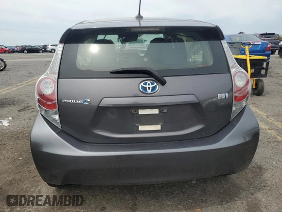 2014 Toyota Prius One z VIN JTDKDTB33E1066355, wystawiony jako Copart lot #58524285 z przebiegiem Nie podano mil oraz Szkoda całkowita • Salvage title. Historia ofert i sprzedaży dostępna na DreamBid. Obrazek 6.