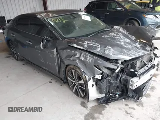 2019 Nissan Maxima SL z VIN 1N4AA6AV5KC369975, wystawiony jako IAAI lot #42007488 z przebiegiem 87 664 mil mil oraz . Historia ofert i sprzedaży dostępna na DreamBid. Obrazek 1.