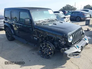 2023 Jeep Wrangler Sahara with VIN 1C4JJXP67PW556933, listed as a IAAI auction lot 41587035 with 20,463 mi miles and . Bid and sale history available at DreamBid. Image 1.