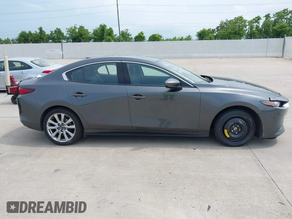 2023 Mazda 3 S Premium with VIN 3MZBPBDM3PM383238, listed as a IAAI auction lot 42477596 with 24,233 mi miles and . Bid and sale history available at DreamBid. Image 13.