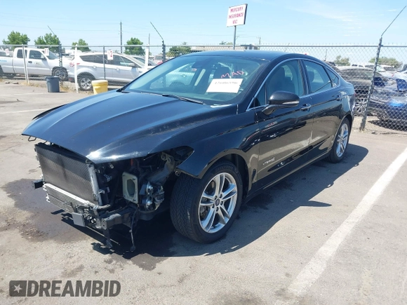 2016 Ford Fusion Titanium Hybrid z VIN 3FA6P0RUXGR123445, wystawiony jako IAAI lot #42606596 z przebiegiem 145 541 mil mil oraz . Historia ofert i sprzedaży dostępna na DreamBid. Obrazek 2.