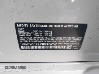 2022 BMW 3 Series 330e with VIN 3MW5P7J08N8C65252, listed as a IAAI auction lot 41229681 with 27,606 mi miles. Bid and sale history available at carsss.com. Image 9.