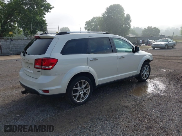 2013 Dodge Journey Crew with VIN 3C4PDCDG0DT591533, listed as a IAAI auction lot 42630548 with 164,961 mi miles and . Bid and sale history available at DreamBid. Image 4.