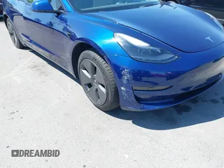 2023 Tesla Model 3 with VIN 5YJ3E1EA1PF431190, listed as a IAAI auction lot 41980007 with 26,164 mi miles and . Bid and sale history available at DreamBid. Image 19.