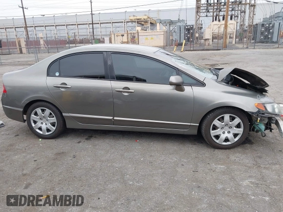 2006 Honda Civic LX with VIN 2HGFA16586H507296, listed as a IAAI auction lot 42101001 with 144,781 mi miles and . Bid and sale history available at DreamBid. Image 14.