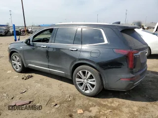 2023 Cadillac XT6 FWD Premium Luxury with VIN 1GYKPCRS4PZ103061, listed as a Copart auction lot 49300205 with 72,131 mi miles and Salvage title. Bid and sale history available at DreamBid. Image 2.