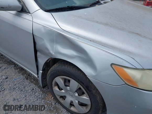 2007 Toyota Camry CE with VIN 4T1BE46KX7U074048, listed as a IAAI auction lot 42101519 with 214,034 mi miles and . Bid and sale history available at DreamBid. Image 6.