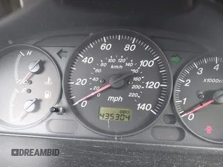 2000 Mazda Protege DX with VIN JM1BJ2221Y0208156, listed as a IAAI auction lot 41609657 with 435,304 mi miles and . Bid and sale history available at DreamBid. Image 7.