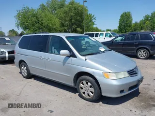 2004 Honda Odyssey EX-RES z VIN 5FNRL18834B115326, wystawiony jako IAAI lot #42396910 z przebiegiem 260 206 mil mil oraz . Historia ofert i sprzedaży dostępna na DreamBid. Obrazek 1.
