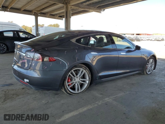 2014 Tesla Model S 60 with VIN 5YJSA1H17EFP63229, listed as a Copart auction lot 51776195 with 156,356 mi miles and Salvage Title. Bid and sale history available at DreamBid. Image 3.