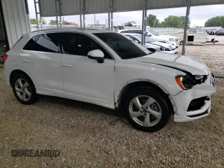 2021 Audi Q3 Premium with VIN WA1AUCF3XM1094216, listed as a Copart auction lot 58710615 with 86,743 mi miles and Salvage title. Bid and sale history available at DreamBid. Image 4.