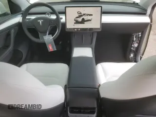 2023 Tesla Model Y Long Range z VIN 7SAYGDEE3PF916132, wystawiony jako Copart lot #51645625 z przebiegiem 28 238 mil mil oraz Szkoda całkowita • Salvage title. Historia ofert i sprzedaży dostępna na DreamBid. Obrazek 8.