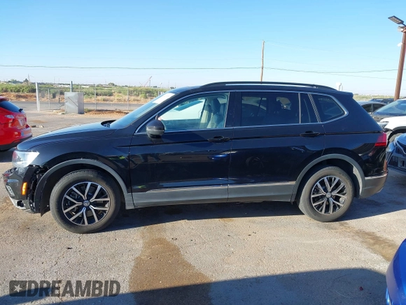 2021 Volkswagen Tiguan SE z VIN 3VV3B7AX0MM080853, wystawiony jako IAAI lot #42406539 z przebiegiem 73 295 mil mil oraz . Historia ofert i sprzedaży dostępna na DreamBid. Obrazek 15.