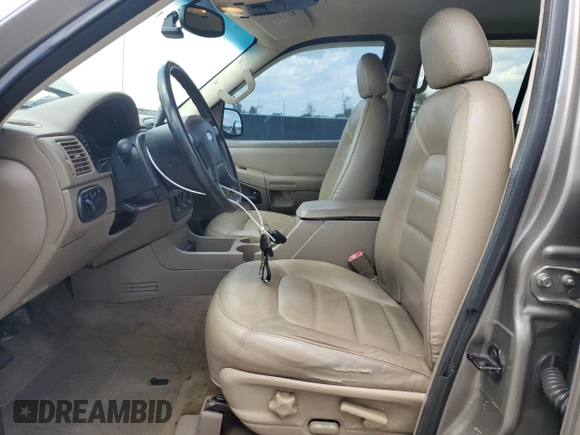 2002 Ford Explorer XLT with VIN 1FMZU63K32UD65713, listed as a Copart auction lot 54767205 with 255,013 mi miles and Salvage Title. Bid and sale history available at DreamBid. Image 7.