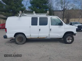 2011 Ford Econoline Cargo Commercial with VIN 1FTNE2EL0BDB36890, listed as a IAAI auction lot 42049933 with Not Provided miles. Bid and sale history available at carsss.com. Image 12.
