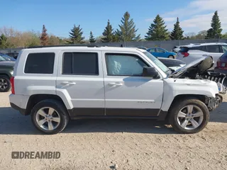 2014 Jeep Patriot Sport z VIN 1C4NJRBB1ED644371, wystawiony jako IAAI lot #42217823 z przebiegiem 139 215 mil mil oraz . Historia ofert i sprzedaży dostępna na DreamBid. Obrazek 13.