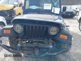 2006 Jeep Wrangler Sport with VIN 1J4FA49S66P732419, listed as a IAAI auction lot 41607851 with 120,099 mi miles. Bid and sale history available at carsss.com. Image 12.