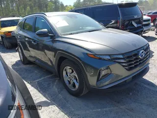 2022 Hyundai Tucson SEL z VIN 5NMJB3AEXNH144592, wystawiony jako IAAI lot #42037487 z przebiegiem 75 651 mil mil oraz . Historia ofert i sprzedaży dostępna na DreamBid. Obrazek 1.