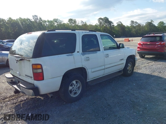 2003 Chevrolet Tahoe LS z VIN 1GNEC13Z83J195493, wystawiony jako IAAI lot #42472037 z przebiegiem 228 016 mil mil oraz . Historia ofert i sprzedaży dostępna na DreamBid. Obrazek 4.