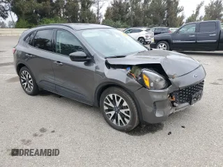 2020 Ford Escape SE Sport Hybrid with VIN 1FMCU0BZ7LUB70460, listed as a Copart auction lot 55623925 with 63,550 mi miles and Salvage title. Bid and sale history available at DreamBid. Image 4.