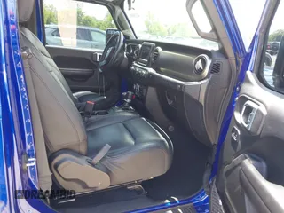 2019 Jeep Wrangler Unlimited Sport Altitude with VIN 1C4HJXDG2KW532866, listed as a IAAI auction lot 42320008 with 66,316 mi miles and . Bid and sale history available at DreamBid. Image 5.