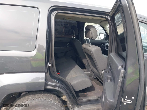 2011 Jeep Liberty Sport with VIN 1J4PN2GK2BW581496, listed as a IAAI auction lot 42080245 with 171,626 mi miles. Bid and sale history available at carsss.com. Image 8.