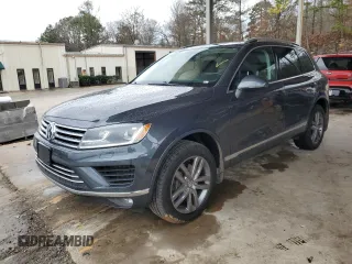 2015 Volkswagen Touareg Lux с VIN WVGEP9BP5FD002596, выставлен на аукционе Copart как лот 43382525 с пробегом Не указан миль и Списание • Salvage title. История ставок и продаж доступна на DreamBid. Изображение 1.