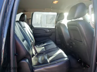 2014 Chevrolet Suburban LT with VIN 1GNSKJE73ER246291, listed as a Copart auction lot 74231304 with 140,688 mi miles and Salvage Title. Bid and sale history available at carsss.com. Image 22.