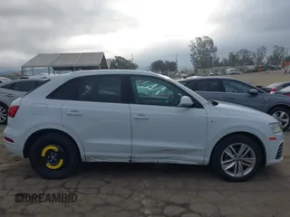 2018 Audi Q3 Premium z VIN WA1BCCFSXJR028356, wystawiony jako IAAI lot #41761544 z przebiegiem 82 877 mil mil oraz . Historia ofert i sprzedaży dostępna na DreamBid. Obrazek 14.