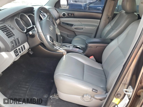 2014 Toyota Tacoma PreRunner with VIN 5TFJU4GN4EX051159, listed as a Copart auction lot 49817645 with 130,001 mi miles and Salvage Title. Bid and sale history available at carsss.com. Image 7.