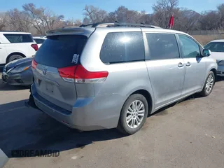 2011 Toyota Sienna XLE AAS with VIN 5TDYK3DC4BS014986, listed as a IAAI auction lot 41763681 with 169,619 mi miles. Bid and sale history available at carsss.com. Image 4.