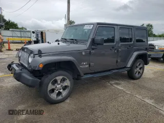 2018 Jeep Wrangler Unlimited Altitude with VIN 1C4HJWEG4JL873226, listed as a Copart auction lot 61467605 with 72,334 mi miles and Salvage title. Bid and sale history available at DreamBid. Image 1.