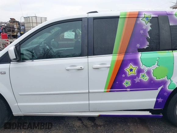 2014 Dodge Grand Caravan SXT with VIN 2C4RDGCG6ER361842, listed as a IAAI auction lot 41827951 with 100,845 mi miles and . Bid and sale history available at DreamBid. Image 14.