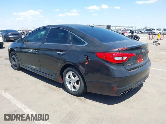 2015 Hyundai Sonata Sport with VIN 5NPE34ABXFH084893, listed as a IAAI auction lot 42066253 with 122,923 mi miles and . Bid and sale history available at carsss.com. Image 3.