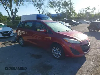 2014 Mazda Mazda5 Sport with VIN JM1CW2BLXE0163650, listed as a IAAI auction lot 42024762 with 137,314 mi miles. Bid and sale history available at carsss.com. Image 1.