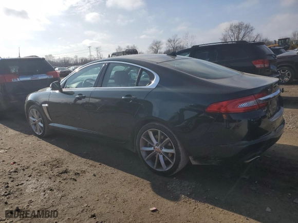 2015 Jaguar XF V6 Portfolio with VIN SAJWJ0FF2F8U53521, listed as a Copart auction lot 85555784 with 100,969 mi miles and Salvage Title. Bid and sale history available at carsss.com. Image 2.