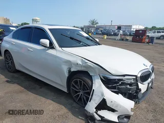 2019 BMW 3 Series 330i xDrive with VIN WBA5R7C51KAJ80336, listed as a IAAI auction lot 42396189 with 83,034 mi miles and . Bid and sale history available at DreamBid. Image 1.