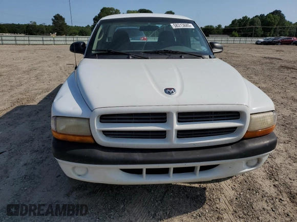 2001 Dodge Dakota z VIN 1B7GL22X21S128774, wystawiony jako Copart lot #58313685 z przebiegiem 167 355 mil mil oraz Czysty tytuł • Clean title. Historia ofert i sprzedaży dostępna na DreamBid. Obrazek 5.