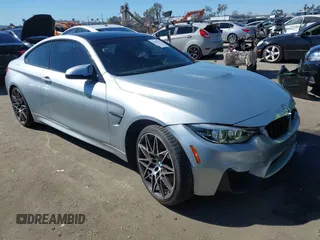 2018 BMW M4 with VIN WBS4Y9C5XJAC87537, listed as a IAAI auction lot 41657531 with 54,665 mi miles. Bid and sale history available at carsss.com. Image 1.