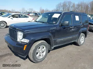 2011 Jeep Liberty Sport 70th Anniversary with VIN 1J4PN2GKXBW539030, listed as a IAAI auction lot 41913633 with 115,605 mi miles. Bid and sale history available at carsss.com. Image 2.