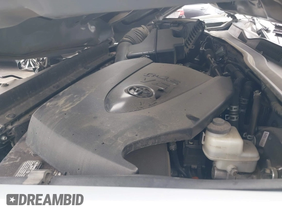 2021 Toyota Tacoma SR with VIN 3TMCZ5AN2MM405869, listed as a IAAI auction lot 42094533 with 78,449 mi miles and . Bid and sale history available at DreamBid. Image 10.
