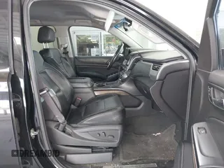2015 Chevrolet Suburban LT with VIN 1GNSKJKC7FR199544, listed as a IAAI auction lot 42169017 with 219,219 mi miles and . Bid and sale history available at DreamBid. Image 5.