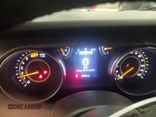 2023 Jeep Wrangler Sport with VIN 1C4HJXAG7PW617021, listed as a Copart auction lot 59928305 with 8,503 mi miles and Salvage title. Bid and sale history available at DreamBid. Image 9.