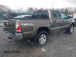 2015 Toyota Tacoma with VIN 3TMLU4EN1FM201554, listed as a IAAI auction lot 42008012 with 118,313 mi miles and . Bid and sale history available at DreamBid. Image 4.