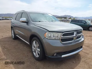 2011 Dodge Durango Crew with VIN 1D4RE4GGXBC599240, listed as a IAAI auction lot 41903956 with 133,752 mi miles and . Bid and sale history available at carsss.com. Image 1.