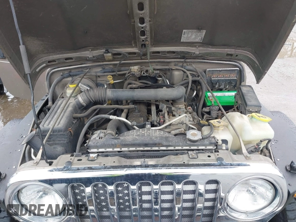 2006 Jeep Wrangler Sport Right Hand Drive with VIN 1J4F449S06P725862, listed as a IAAI auction lot 41562989 with 121,997 mi miles. Bid and sale history available at carsss.com. Image 10.