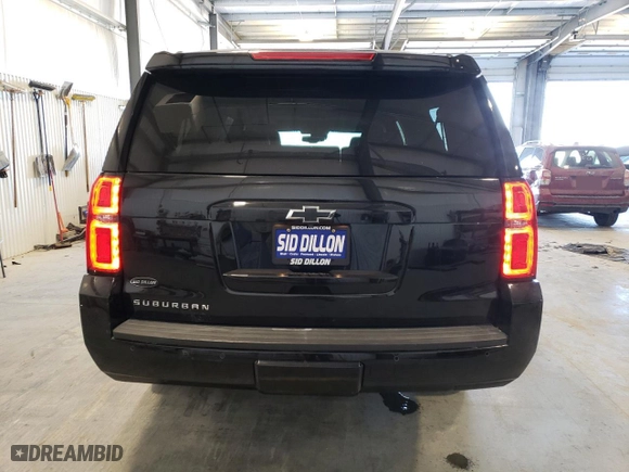 2019 Chevrolet Suburban LT with VIN 1GNSKHKC2KR299019, listed as a Copart auction lot 42623215 with 84,747 mi miles and Salvage Title. Bid and sale history available at carsss.com. Image 6.